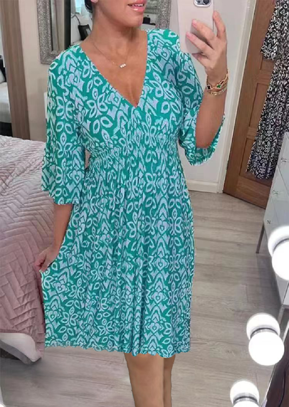 👗Mini tiskana obleka z V-izrezom